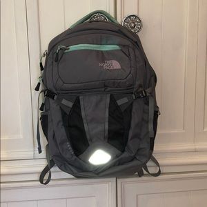 Teal and grey north face backpack